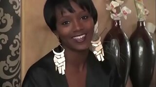 Ebony beauty masturbating at table cosmetic